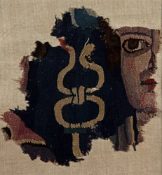 Mandligt ansigt med en caduceus